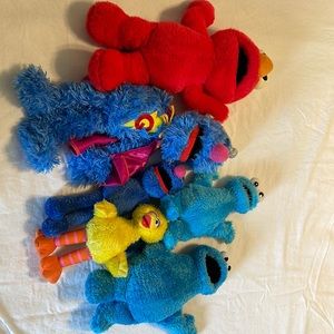 Sesame Street stuffed animals (including tickle me Elmo)